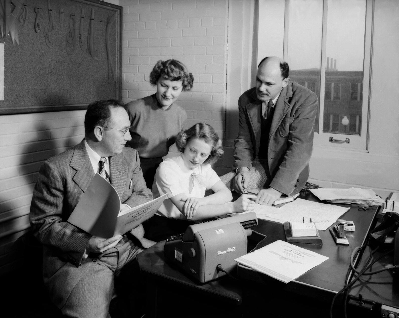 Women computers at NACA Langley working with Monroe calculating machines, 6 March 1951